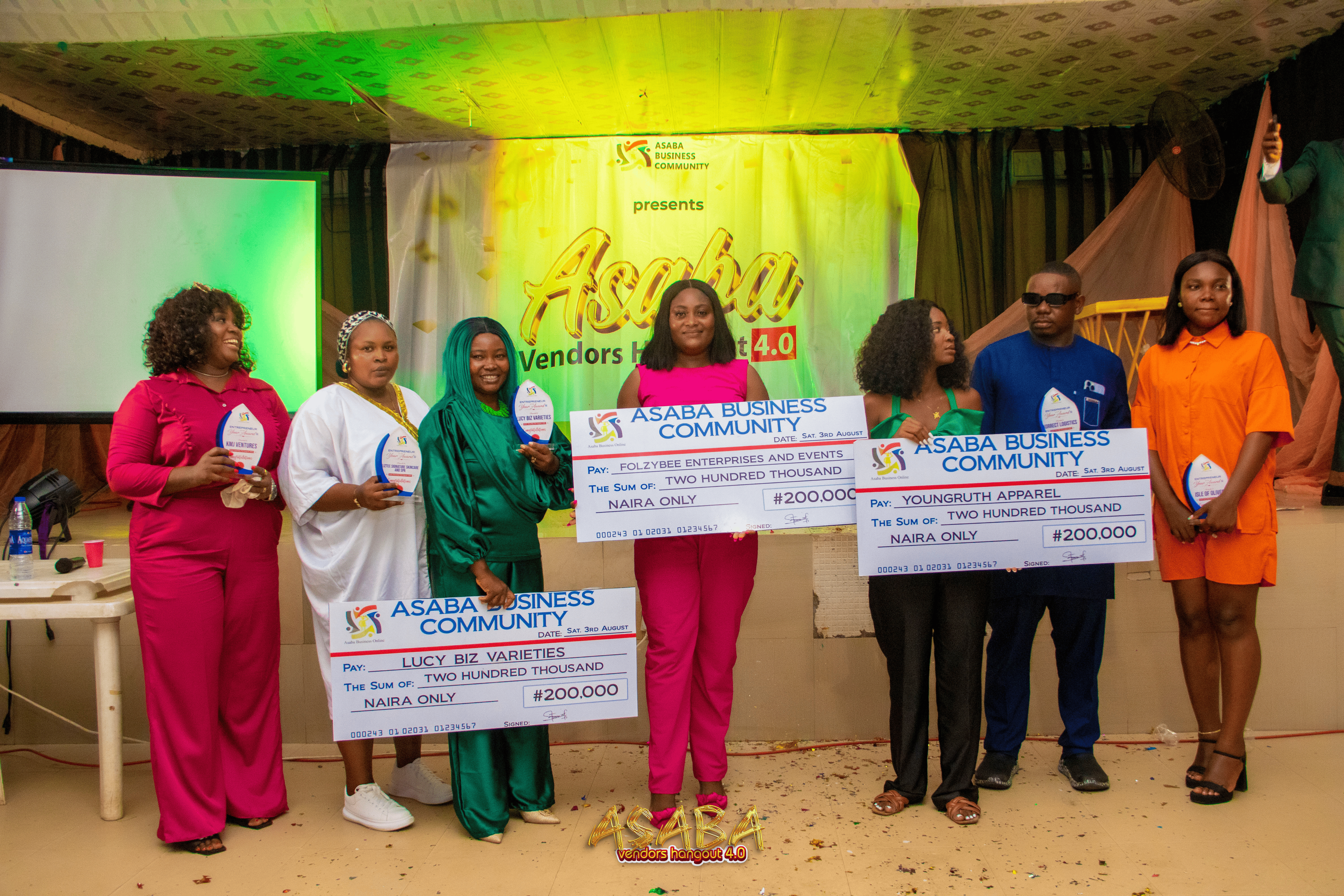 Asaba Business Community vendor exhibition showing stalls and visitors